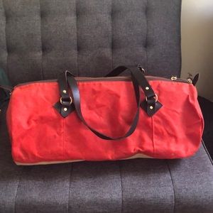 Bespoke red waxed canvas and leather duffel